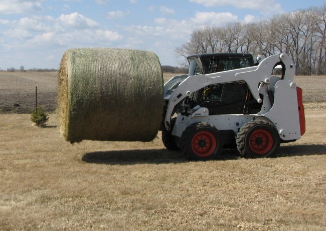 Bale Spear with a bale.